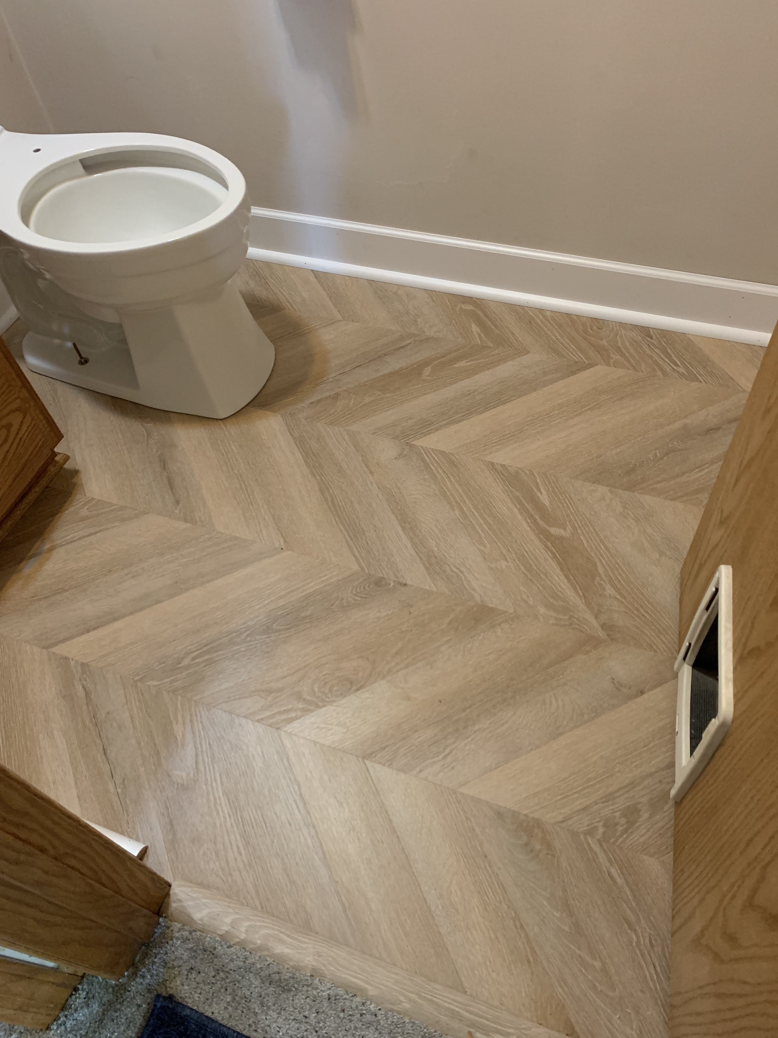 Herringbone vinyl flooring in bathroom